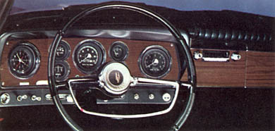 1963 Studebaker Gran Turismo Hawk dashboard, brochure picture with original steering wheel